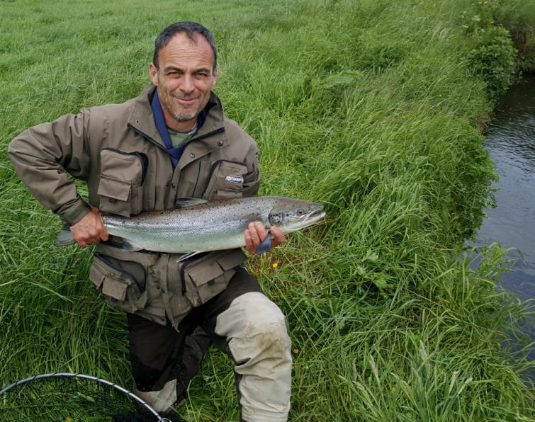 Carl Lowndes with his prize salmon catch